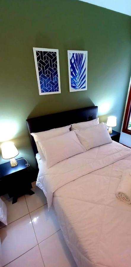 Bliss Hoteis Centro Búzios Exterior foto A bed with two pillows